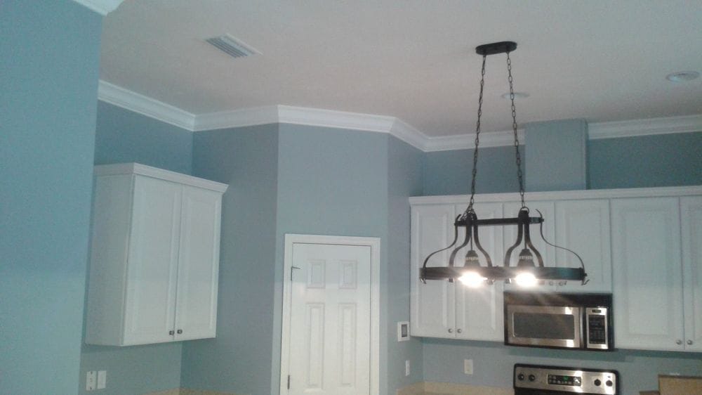 Kitchen interior with crown molding repainted
