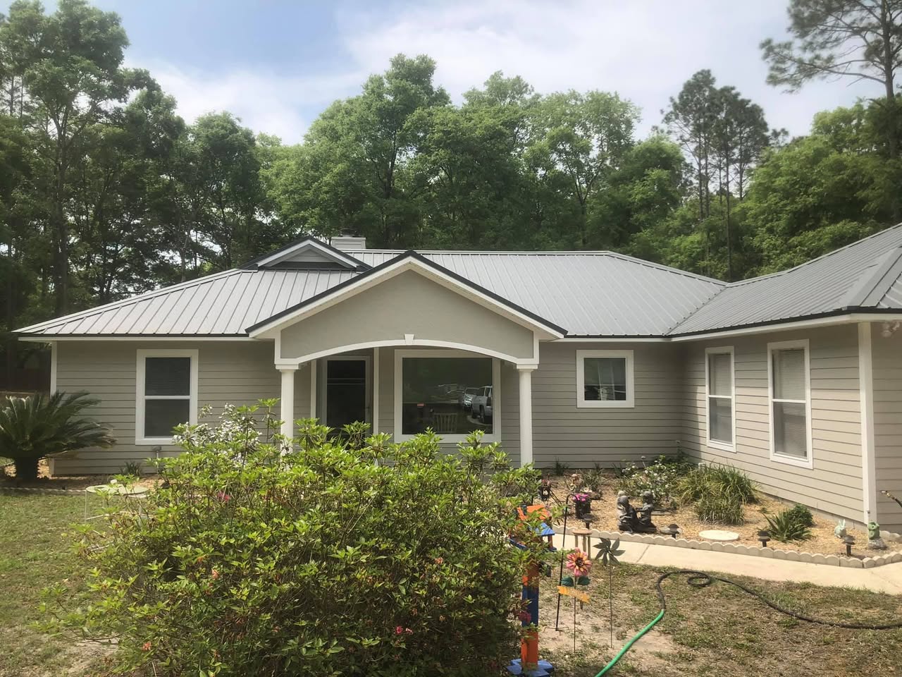 Same home after full exterior repaint by A+ Painting and Repair