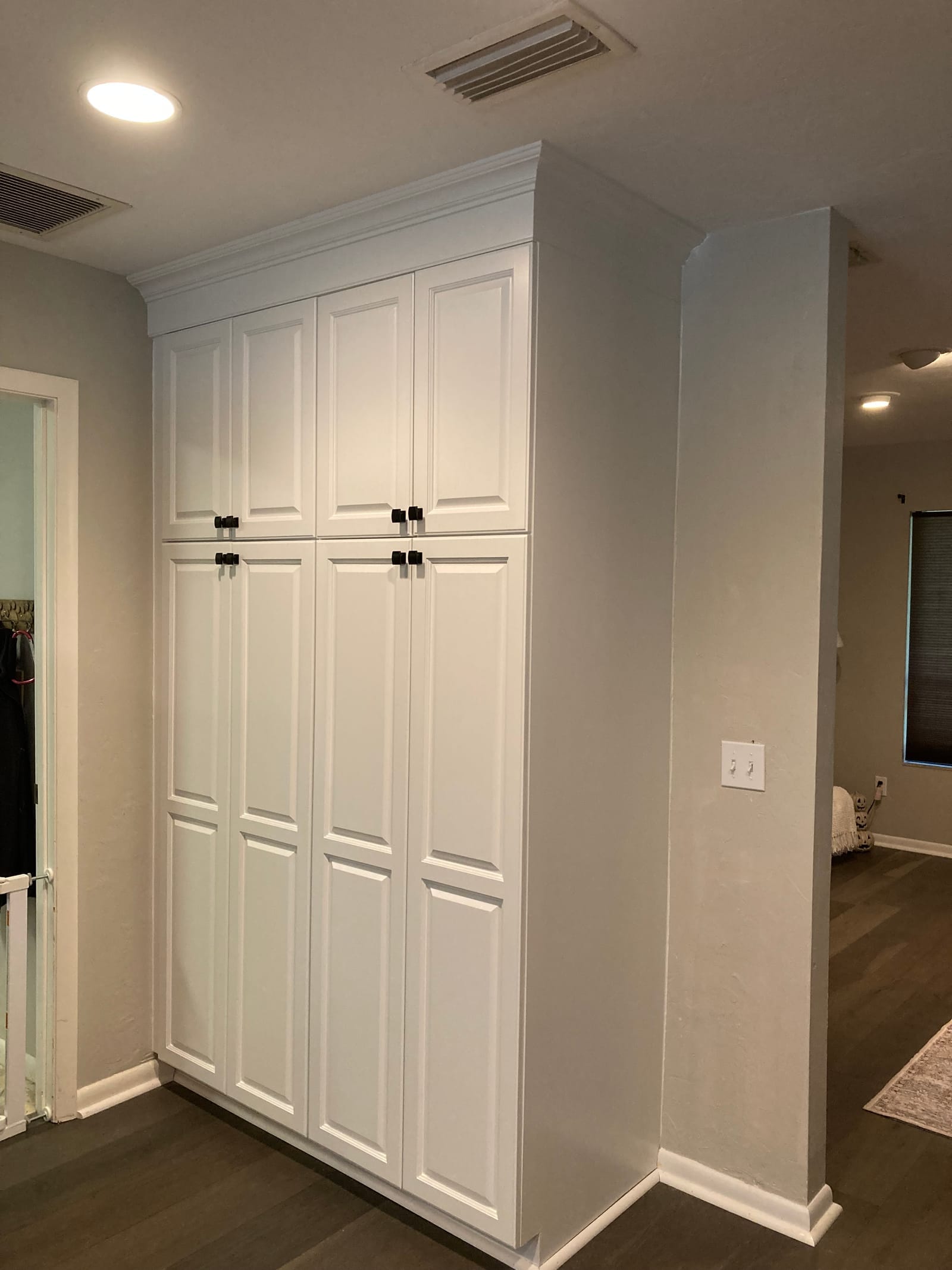 Built-in dresser refinished to white