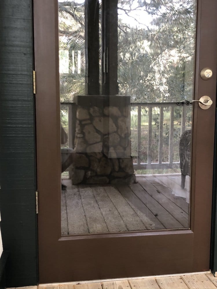 Same screen door painted brown to match exterior trim