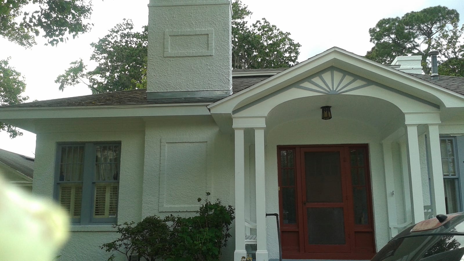 Cream cottage full exterior repaint