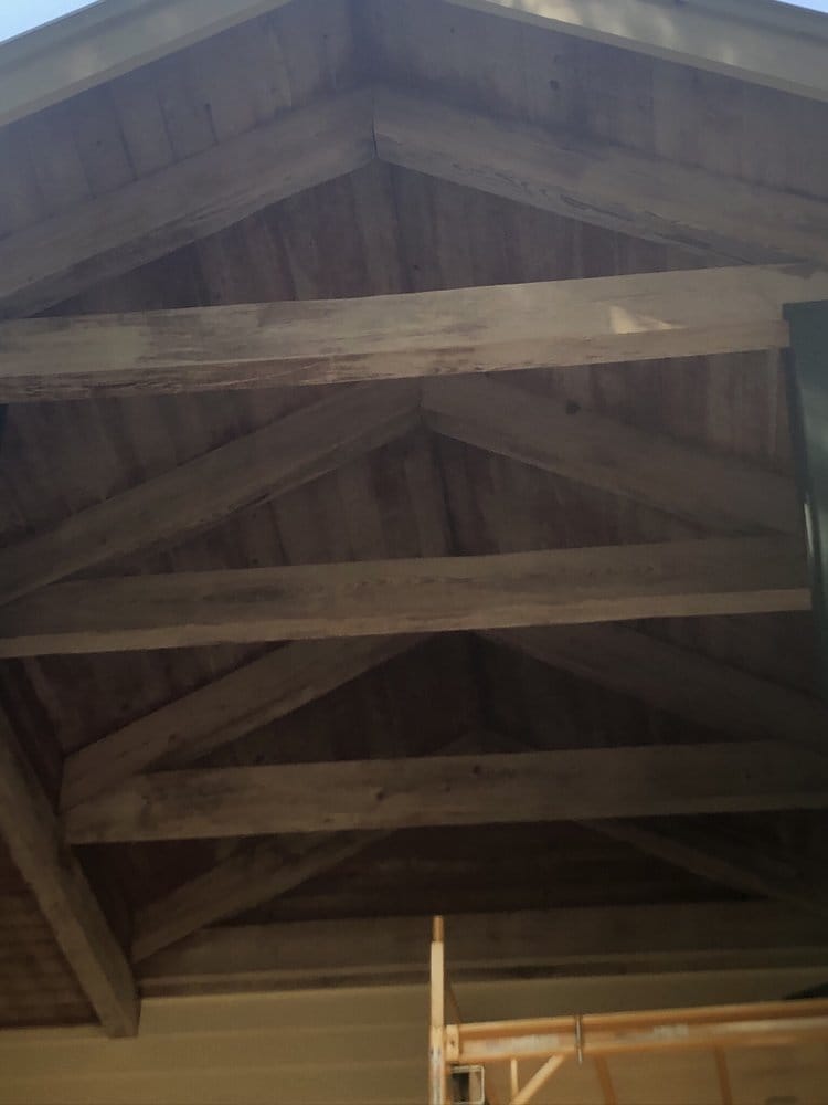 Vaulted gable wood beams before staining
